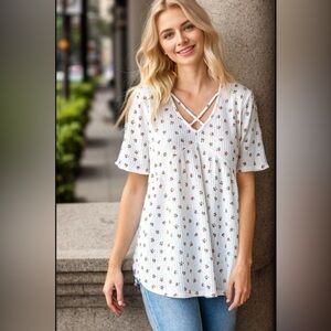 Heimish Full Size Crisscross Ditsy Floral Babydoll Top Plus Size